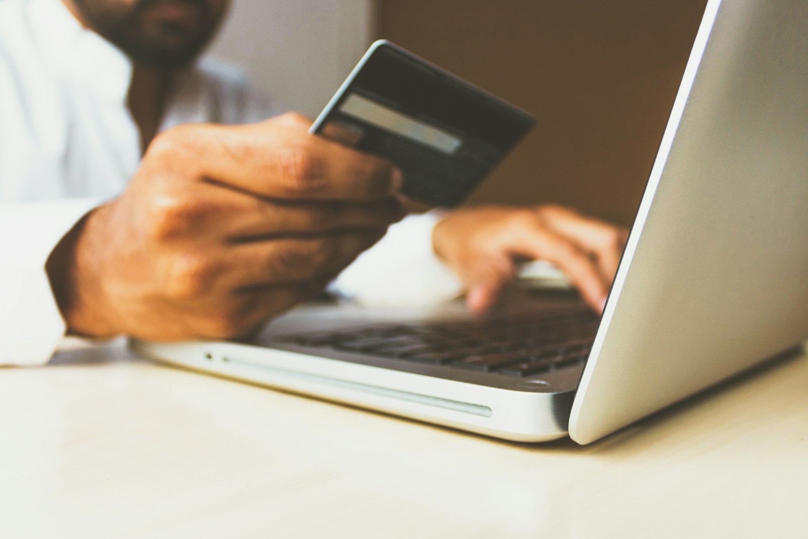 Customer shopping online using a laptop